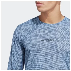 Tee-shirt De Trail Adidas Agravic Longsleeve Trail GFX Blue Dawn Wonder Steel -Location de vêtements d'extérieur. 7f19517de72536d2b8a9bfe0d9dbf3998ed87335 E23ADIDTTH3371041 902